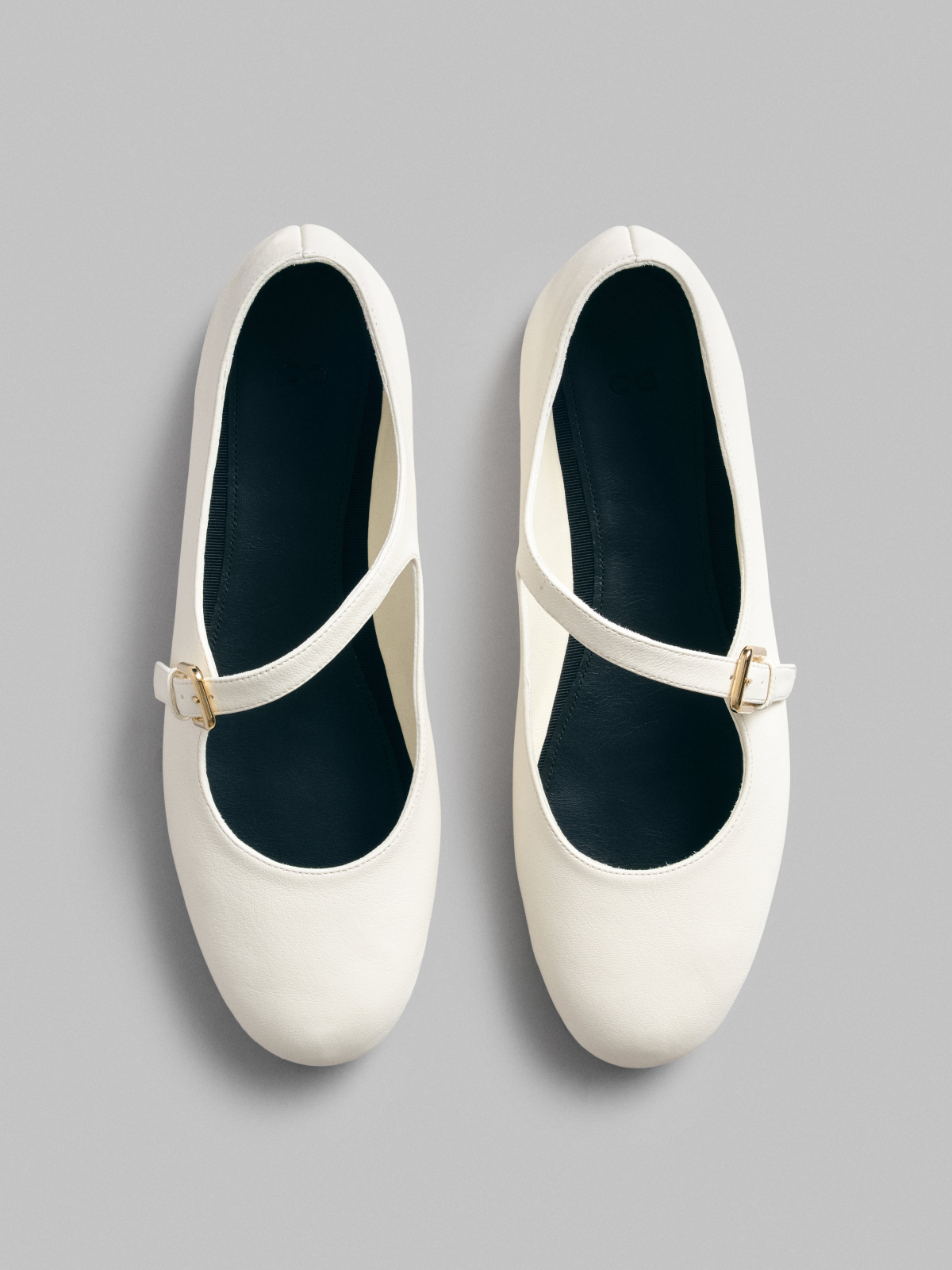 White Round-Toe Flats Mary Janes With Asymmetric Buckle Strap