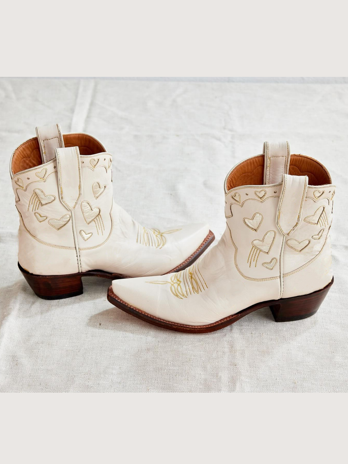 Cream Snip-Toe Western Ankle Booties With Metallic Gold Heart Inlay