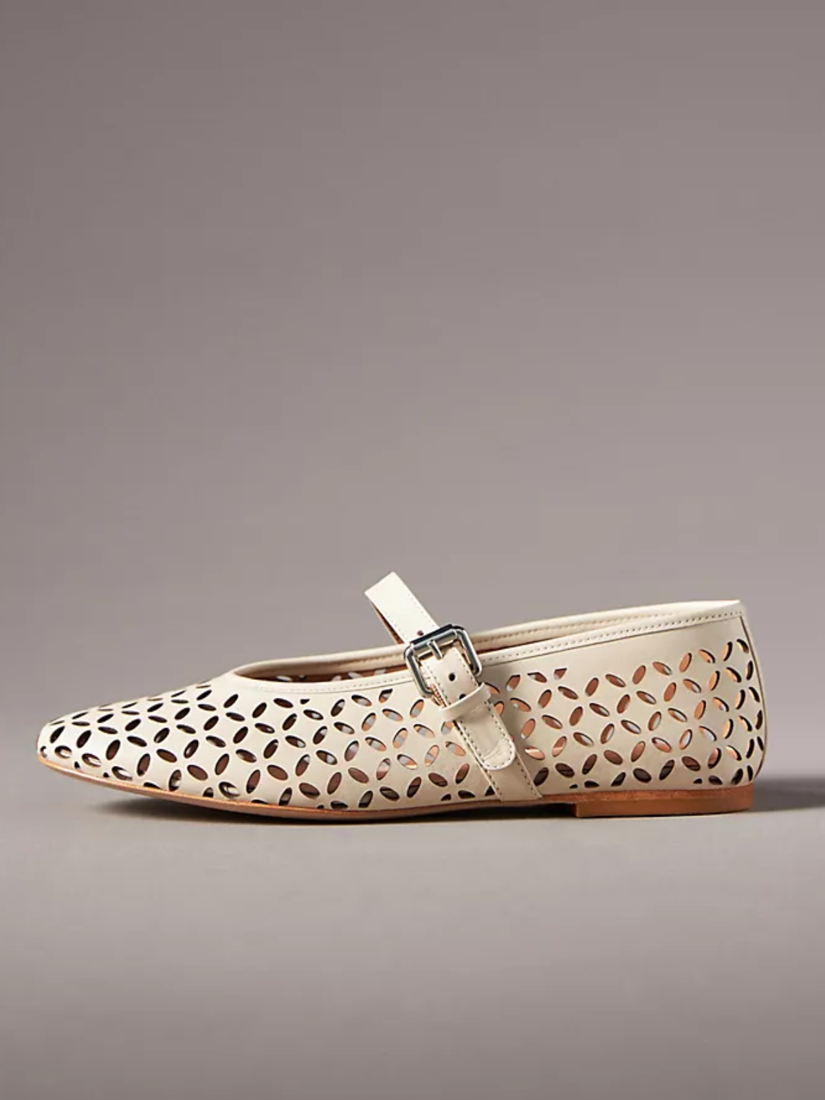 Cream Flats Mary Janes With Floral Cutout And Buckled Strap