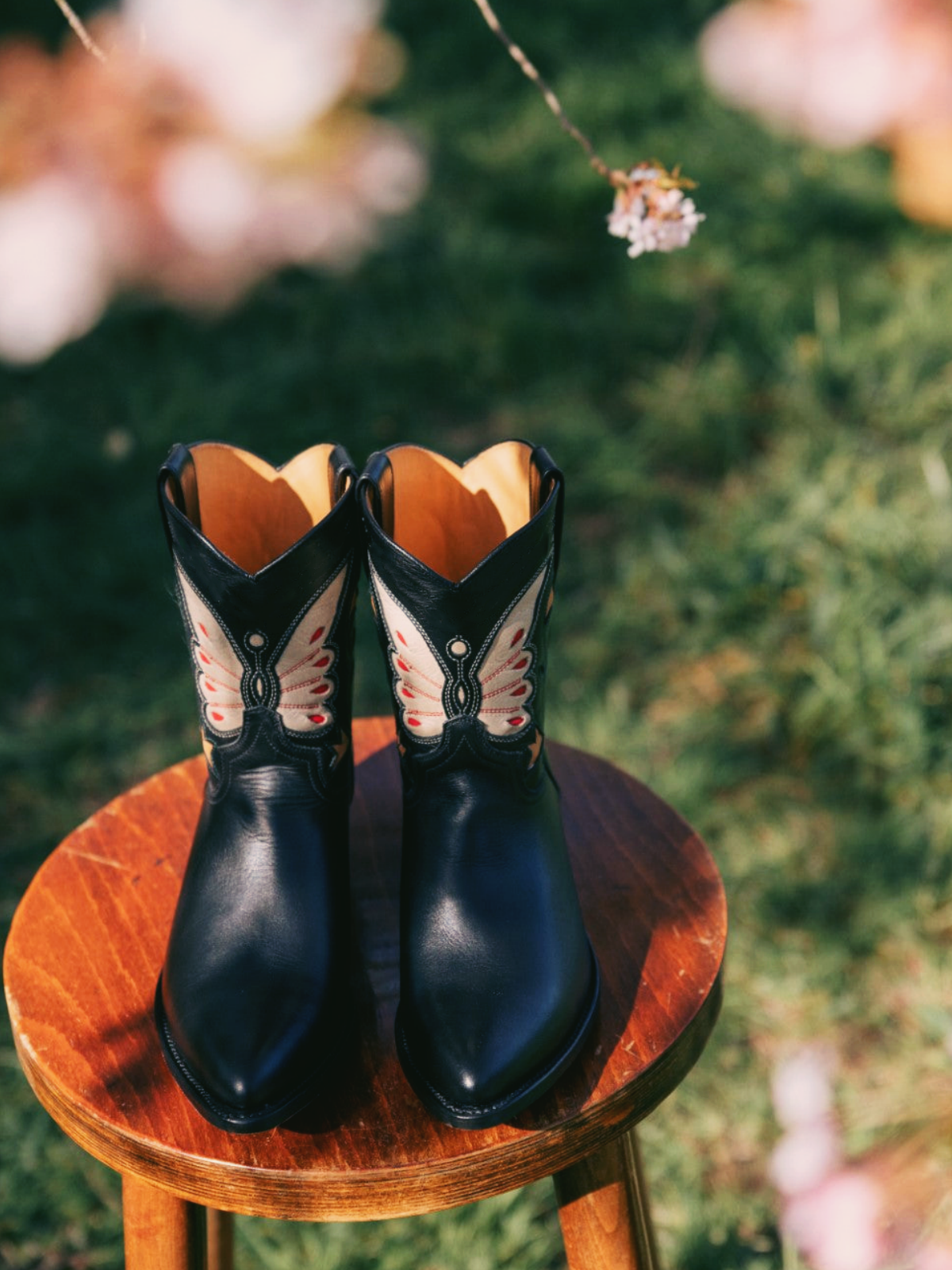 Black Pointed-Toe Cowgirl Ankle Booties With Ivory Butterfly Inlay