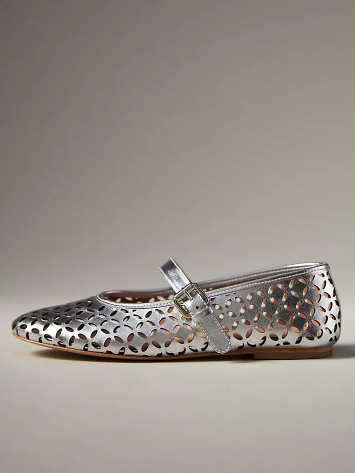 Metallic Silver Flats Mary Janes With Floral Cutout And Buckled Strap