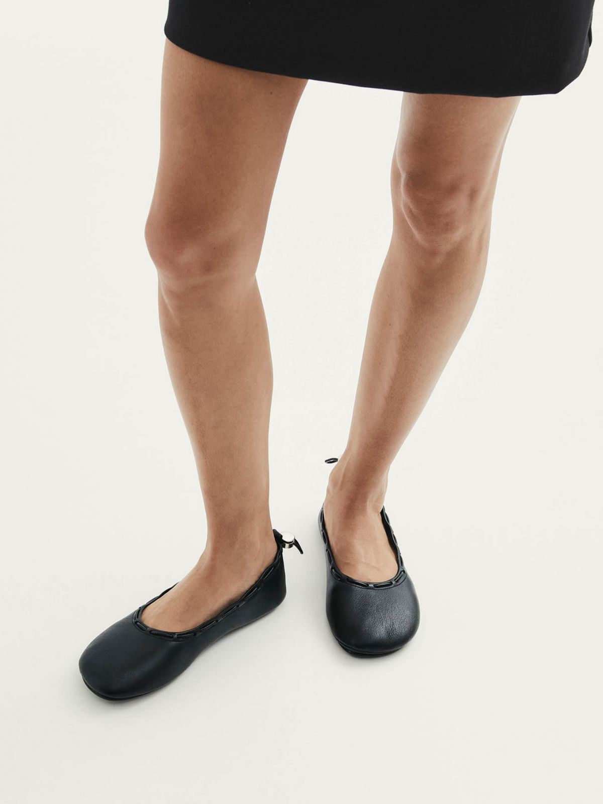 Drawstring Round-Toe Ballet Flats In Black Vegan Leather