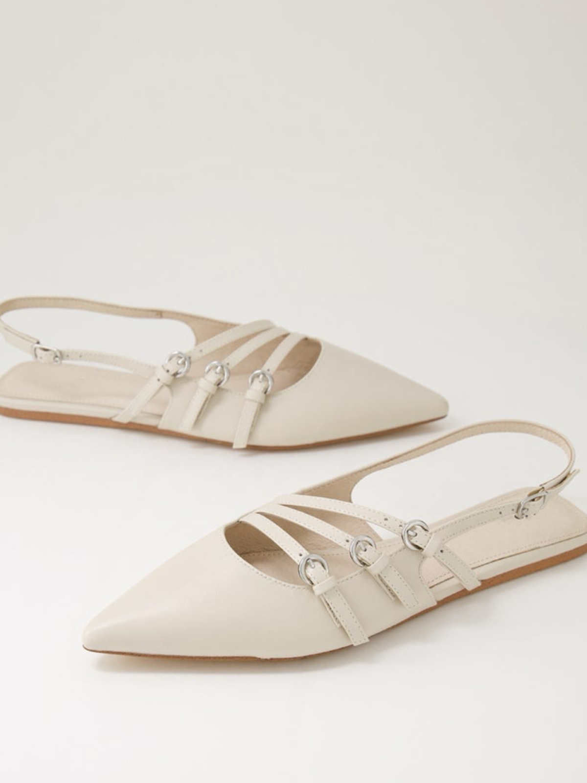 Cream Pointed-Toe Flats With Buckled Slingback