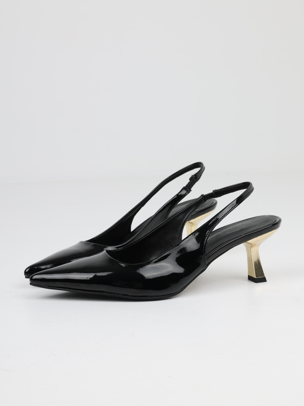 Black Patent Pointy Slingback Pumps With Sculptural Gold Kitten Heels