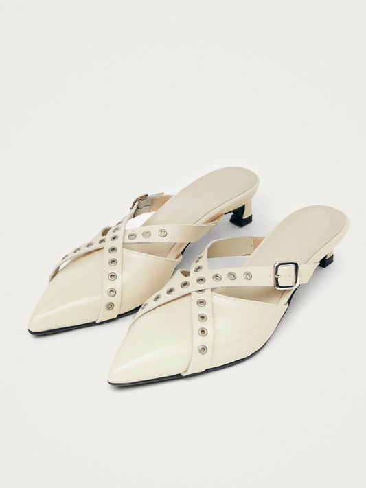 Patent Cream Pointed-Toe Eyelet-Embellished Cross Straps Mules